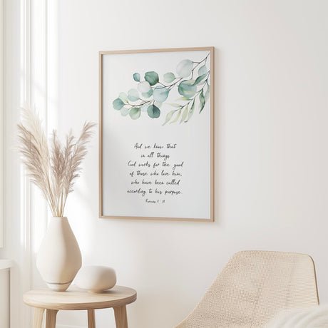 Inspiring Bible verse decor print with Romans 8:28 message and elegant botanical frame.