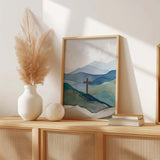 Watercolour-style Christian wall art showing a cross on a blue and green mountain landscape with the Isaiah 53:5 verse: "By His wounds we are healed."