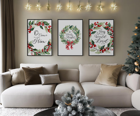 Set of three Christmas prints featuring carol lyrics framed by festive green and red wreaths: 'Joy to the World the Lord is come', 'O Come Let Us Adore Him', and 'O Holy Night'.