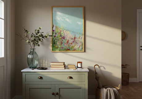‘Colours of the Field’ – Pink, orange, and yellow meadow flowers with duck egg blue sky above.