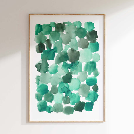 Abstract watercolor print featuring soft emerald green shapes blending beautifully.