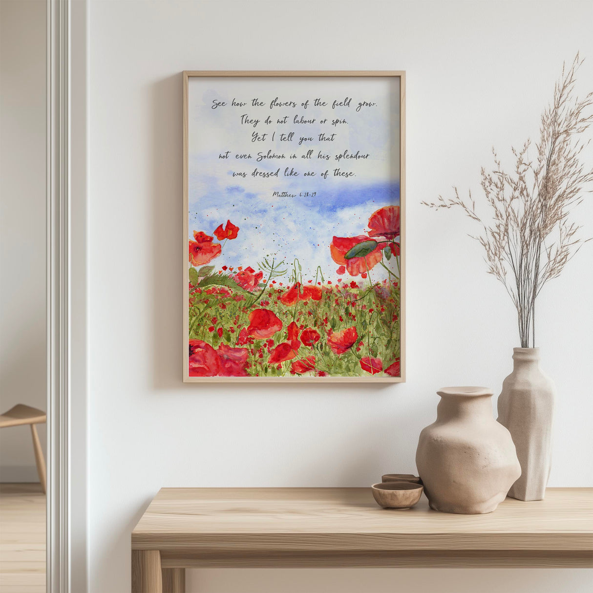 Watercolour poppy field print with Matthew 6:28-29 Bible verse in Christian wall art style.