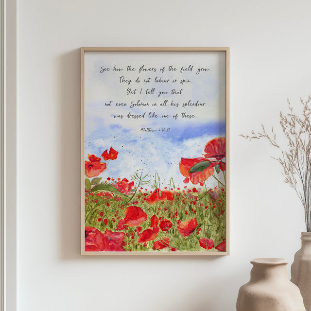 Watercolour poppy field print with Matthew 6:28-29 Bible verse in Christian wall art style.