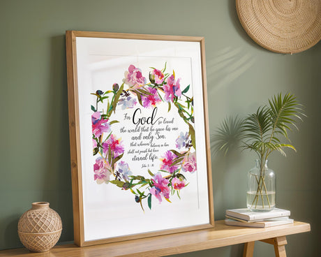 Bible verse wall print, John 3 16 with soft pink floral design for faith-inspired spaces.