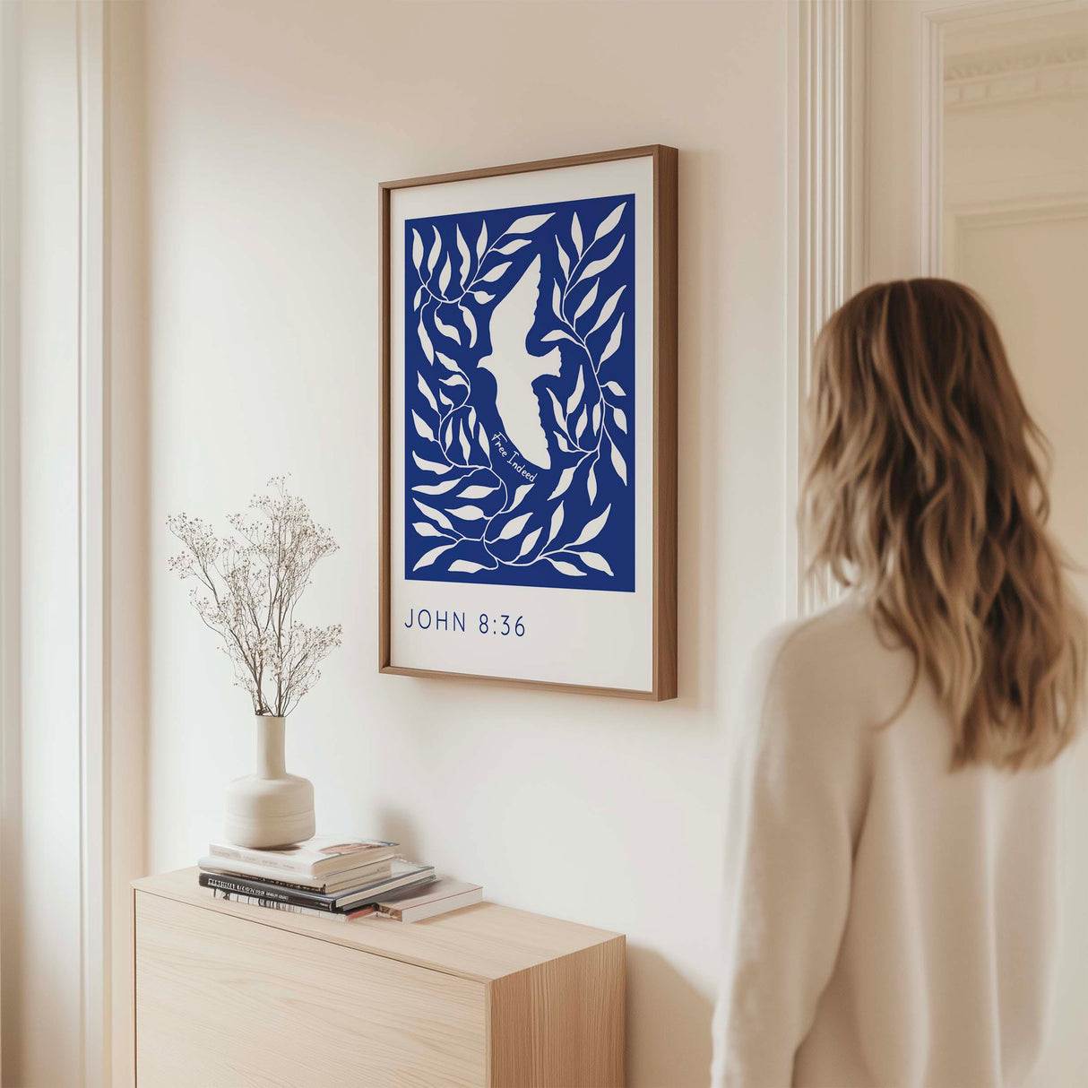 Minimalist Christian print featuring a white dove and the words Free Indeed from John 8:36.