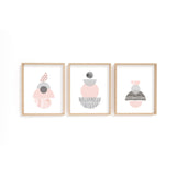 Minimalist geometric shape wall art set of three, with hand-drawn pink and grey abstract forms on white backgrounds.
