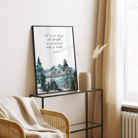 Christian wall art with Psalm 46 1 verse and mountain lake forest scene.