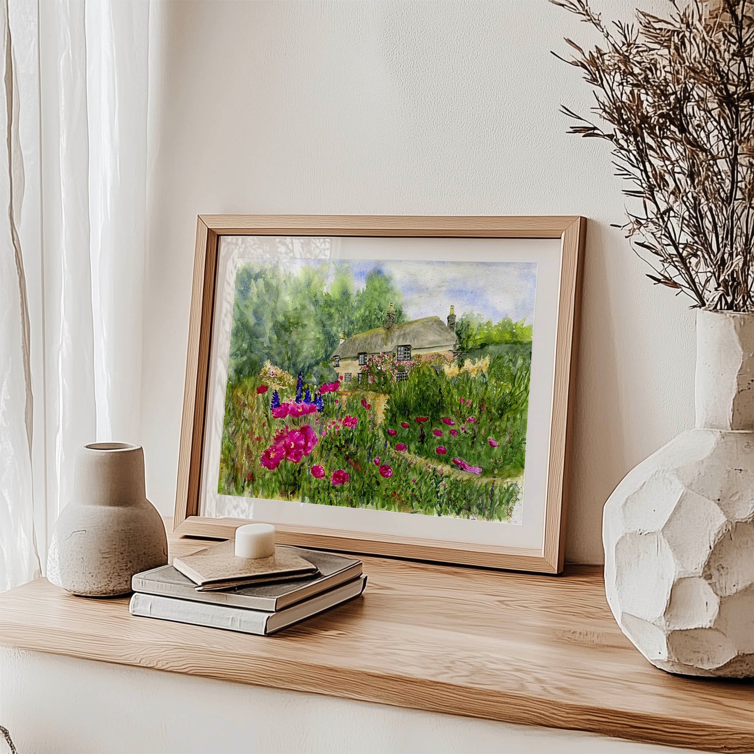 Pink flower thatched house wall decor print. Countryside springtime wall art featuring blooms.