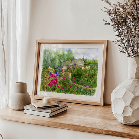 Pink flower thatched house wall decor print. Countryside springtime wall art featuring blooms.