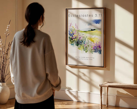 Bible verse print with Ecclesiastes 3:11 over a colourful meadow filled with blooming flowers.