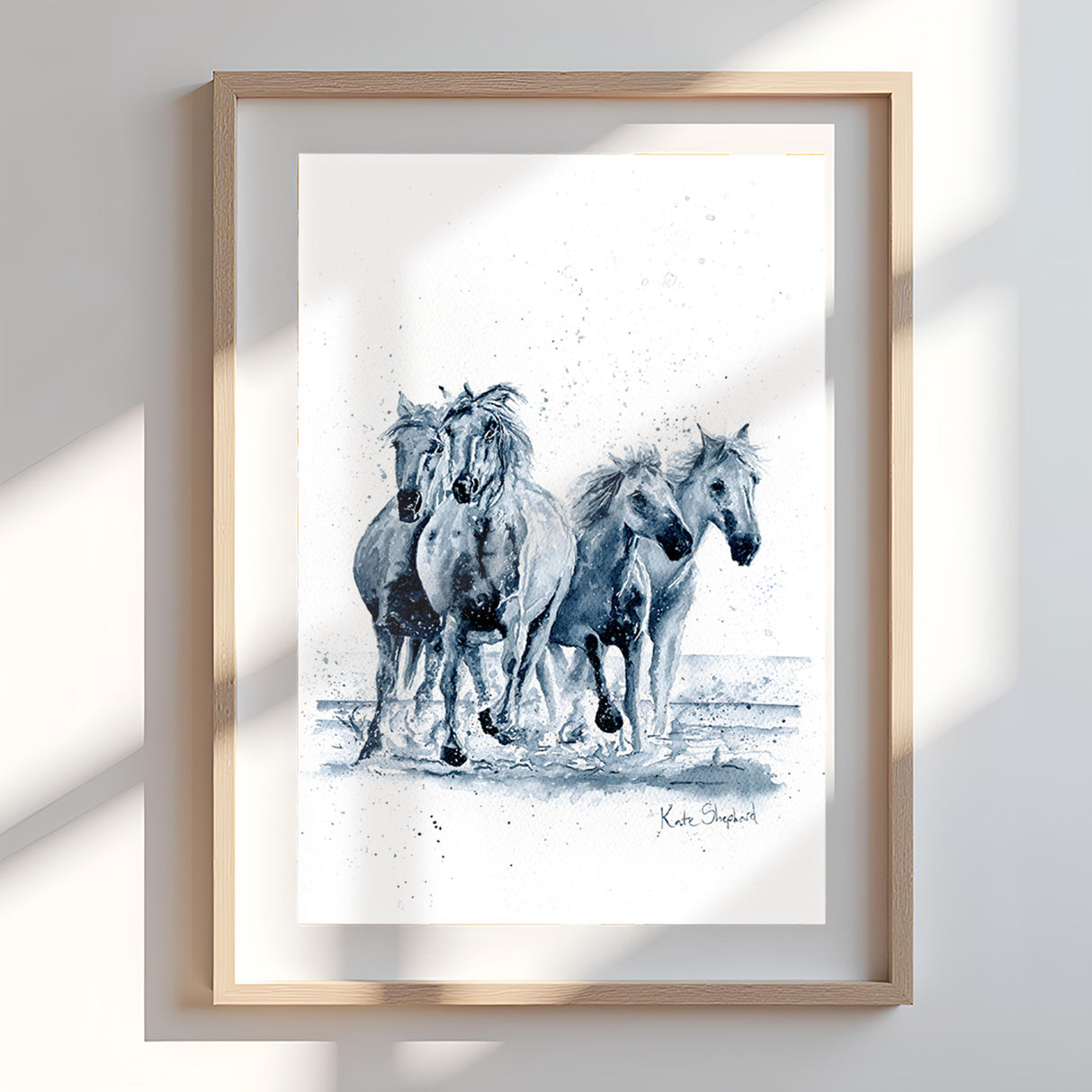 Watercolour art with horses running in a monochrome design.