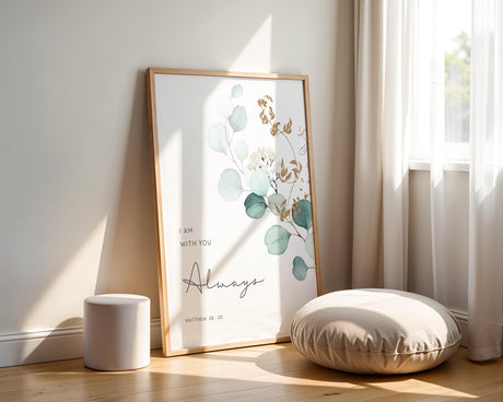 Soft botanical Christian home decor with the verse “I Am With You Always” in neutral green tones.