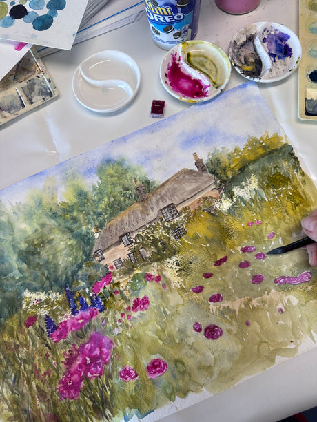 Watercolour painting of Dorset countryside near Hardy’s Cottage, filled with blooming flowers and lush greenery in a dreamy style.