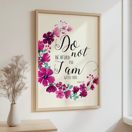 Christian wall art featuring Do Not Be Afraid verse surrounded by delicate pink and purple flowers.