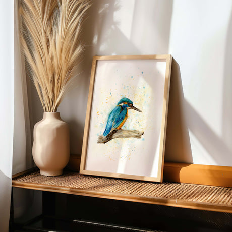 Blue and orange kingfisher bird on a branch in a minimalist watercolour print. Artistic kingfisher watercolour with loose brushstrokes and natural tones.