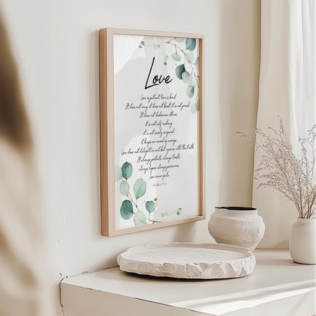 Christian wall art featuring 1 Corinthians 13 scripture and natural floral details on a clean white background.