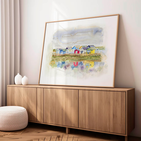 'Beach Huts 1' - Watercolour beach huts coastal wall art of the famous Mudeford Spit beach huts, Dorset — colourful seascape painting with soft dreamy reflections, by Crafty Cow Design.