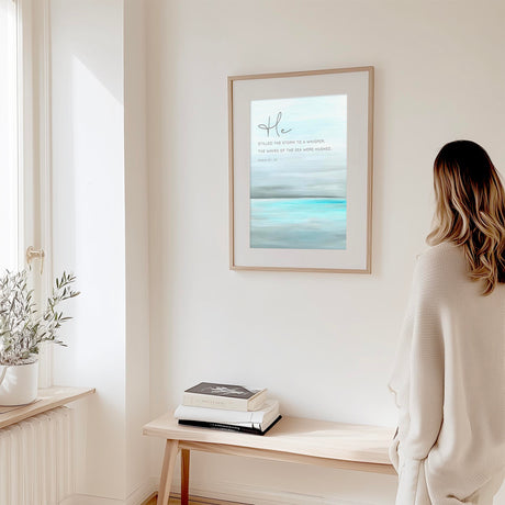 Turquoise Christian print featuring tranquil ocean scene paired with Psalm 107:29 scripture for peaceful decor.