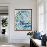 'Wave I' - A stunning blue wave canvas print in fluid acrylic — abstract ocean art in swirling turquoise and deep navy for coastal decor living room wall art and modern coastal interiors, by Crafty Cow Design.