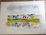 Whimsical beach huts painting with reflections, in a framed coastal decor