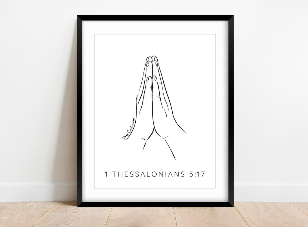 Constantly connected: A minimalist print featuring praying hands and the powerful message of 'Pray Continually' - find peace within.