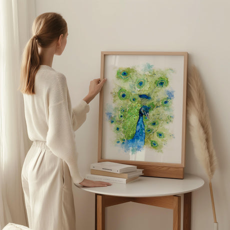 Vibrant peacock artwork with swirling watercolour textures and soft detailing around the feathers. Watercolour peacock head in bold turquoise and deep blue, designed to brighten and uplift your space.

