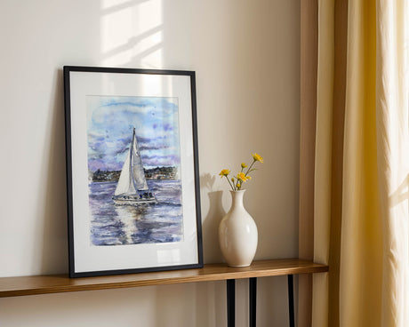 ‘Bay Breeze’ yacht print showing a peaceful sailing scene on calm blue waters.