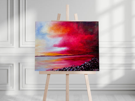 Dramatic coastal painting by Kate Shephard, showing sun breaking through clouds