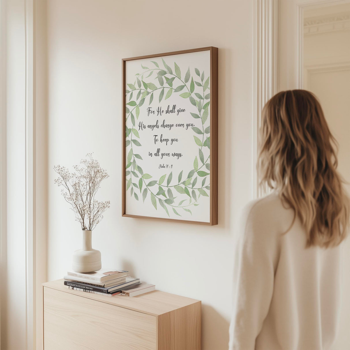 Christian wall art with Psalm 91:11 in a green leaf wreath reminding of angelic protection and divine care.