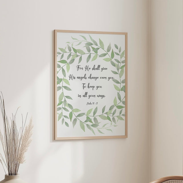Inspirational Christian art with protective angel promise from Psalm 91:11 displayed in a leafy wreath design.