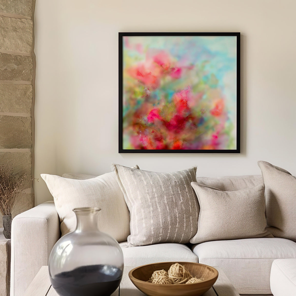 Watercolour abstract art with blooming flower-inspired colours of pink, blue, and green.
