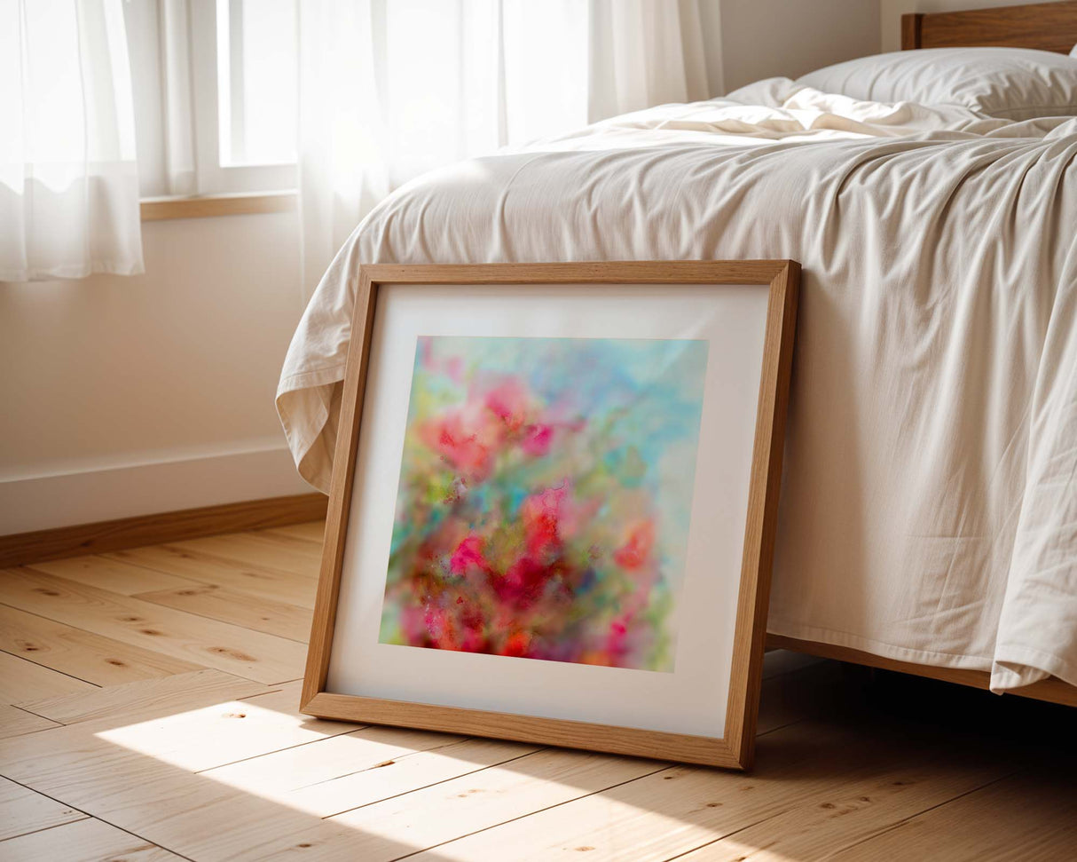 Bright abstract watercolour print in pink, blue, and green, depicting nature’s vibrant blooms.