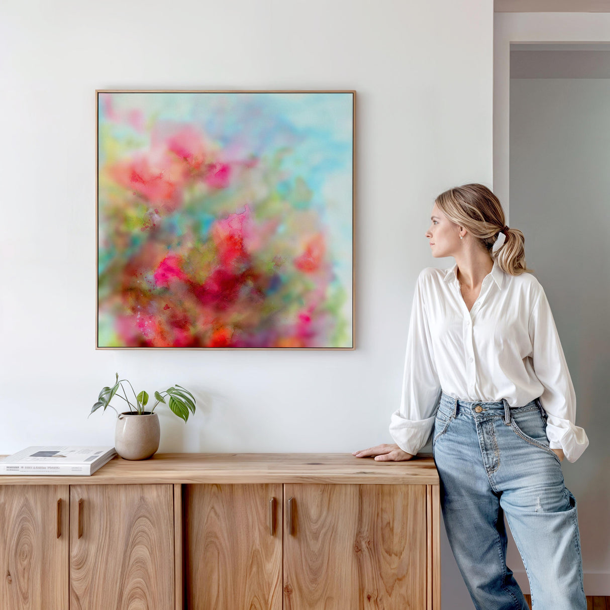 Watercolour print in vibrant hues of pink, peach, and blue, inspired by nature’s beauty.