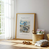 Psalm 37:7 - Scripture wall art print with balanced stone stack, soft sandy tones and gentle blue watercolour background.