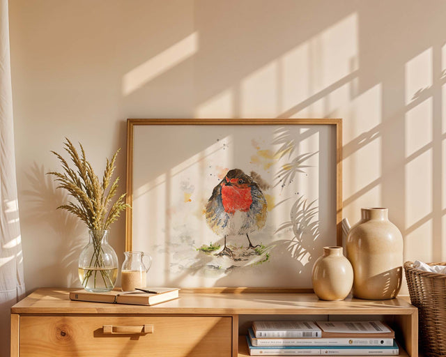 A charming watercolour art print of a robin, titled Among the Twigs, capturing the bird’s gentle character and seasonal beauty with soft, expressive brushstrokes.