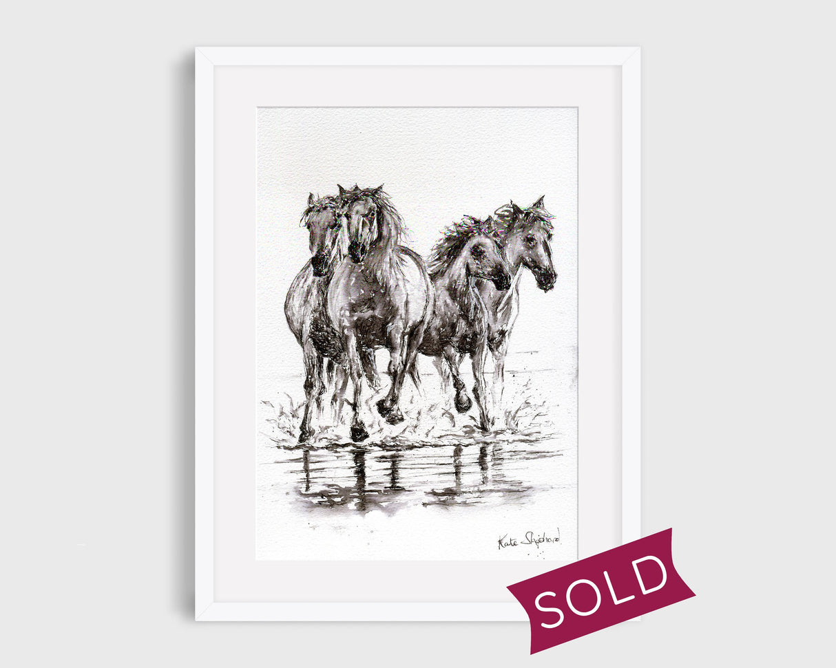 "Pen and ink painting of horses running on the beach, captured on watercolor paper. The artwork showcases movement and energy. Sold piece."