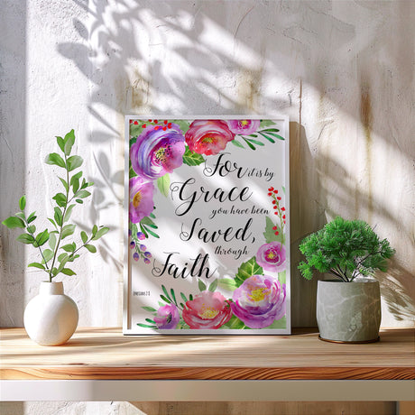 Uplifting faith print with pastel blossoms and elegant typography of Ephesians 2:8. Grace-themed Christian decor with a floral background and a quote about salvation through faith.

