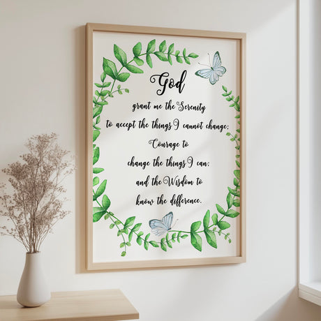 Christian wall art with Serenity Prayer surrounded by nature inspired leaf wreath and butterfly.