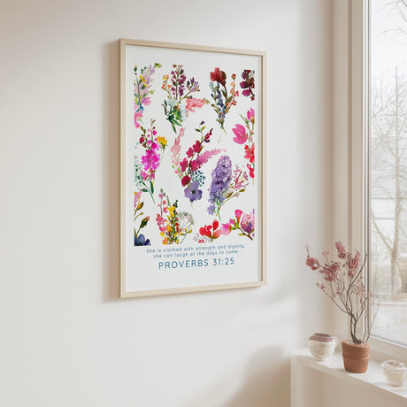 Proverbs 31 25 Bible verse print with delicate floral design and the words “She is clothed with strength and dignity.”