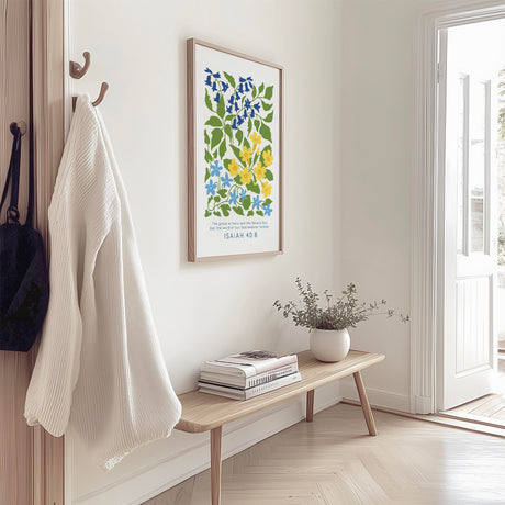 Floral Bible verse wall art with Isaiah 40:8, featuring soft blue and yellow flowers above elegant script.