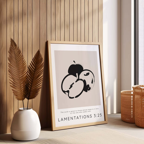 Neutral Christian print with Lamentations 3:25 and bold black apples symbolising hope in God's goodness.