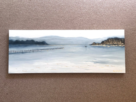 Textured canvas painting of Dorset coastline with soft gold shimmer accents. Atmospheric oil artwork of Brownsea Island, painted in moody blues and warm browns.