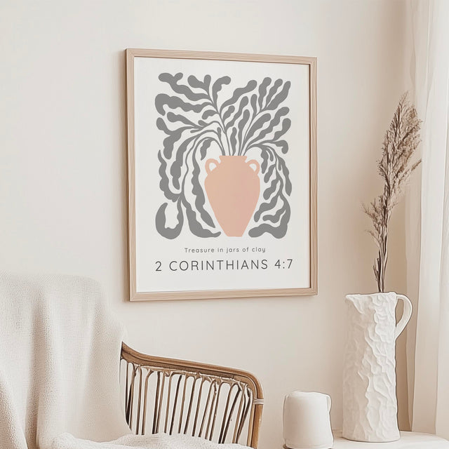 Inspirational Christian wall art with peach pot, botanical vine, and scripture from 2 Corinthians 4:7.