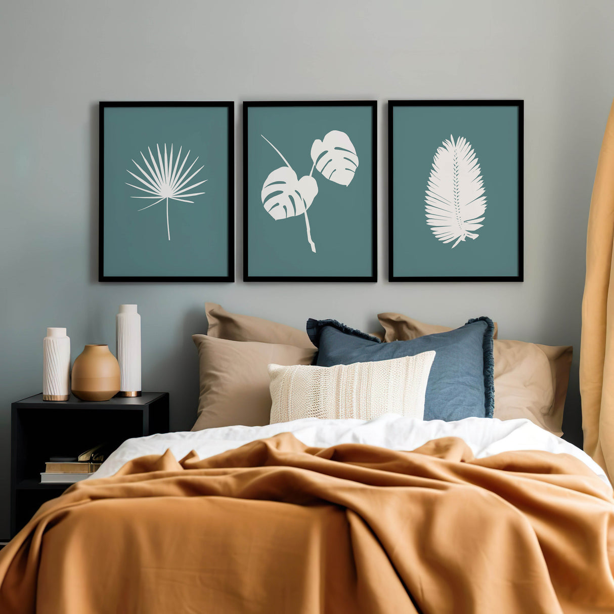 Minimalist tropical leaf wall art set with three hand-drawn prints, each featuring a fine silhouette on a background colour of your choice.