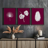 A trio of tropical leaf illustrations in delicate line art, hand-drawn and offered with customizable background colours for a modern, calming vibe.