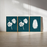 Hand-drawn tropical leaf line art print set of three, showcasing elegant botanical silhouettes with background colour options to suit your space.