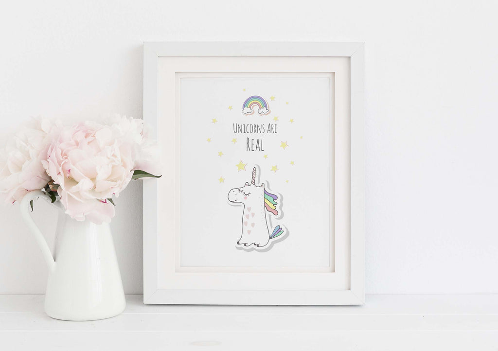 Transform your space into a whimsical wonderland with a stunning unicorn theme print, featuring a rainbow and the affirmation 'Unicorns are Real.