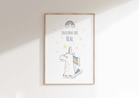 Brighten up any room with a delightful unicorn theme print, boasting a rainbow and the charming words 'Unicorns are Real' beneath a little unicorn.