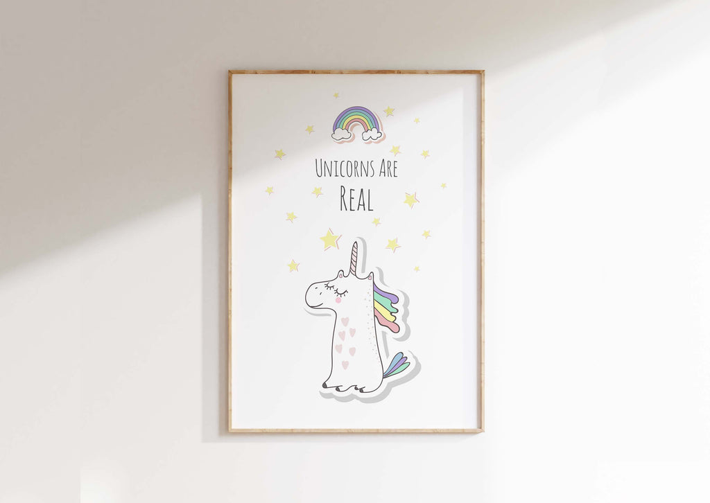 Brighten up any room with a delightful unicorn theme print, boasting a rainbow and the charming words 'Unicorns are Real' beneath a little unicorn.