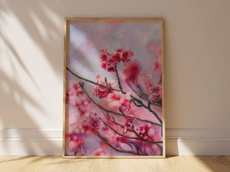 Cherry blossom branches in bloom, drawn in coloured pencil with a dreamy pastel sky behind.
